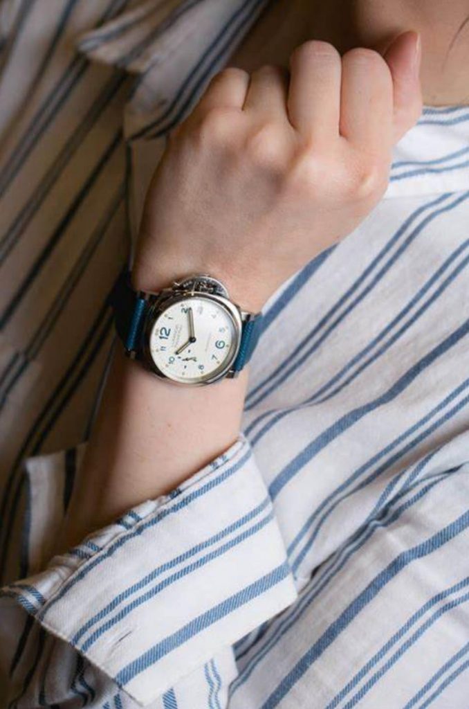 The 38mm fake watch has a blue strap.