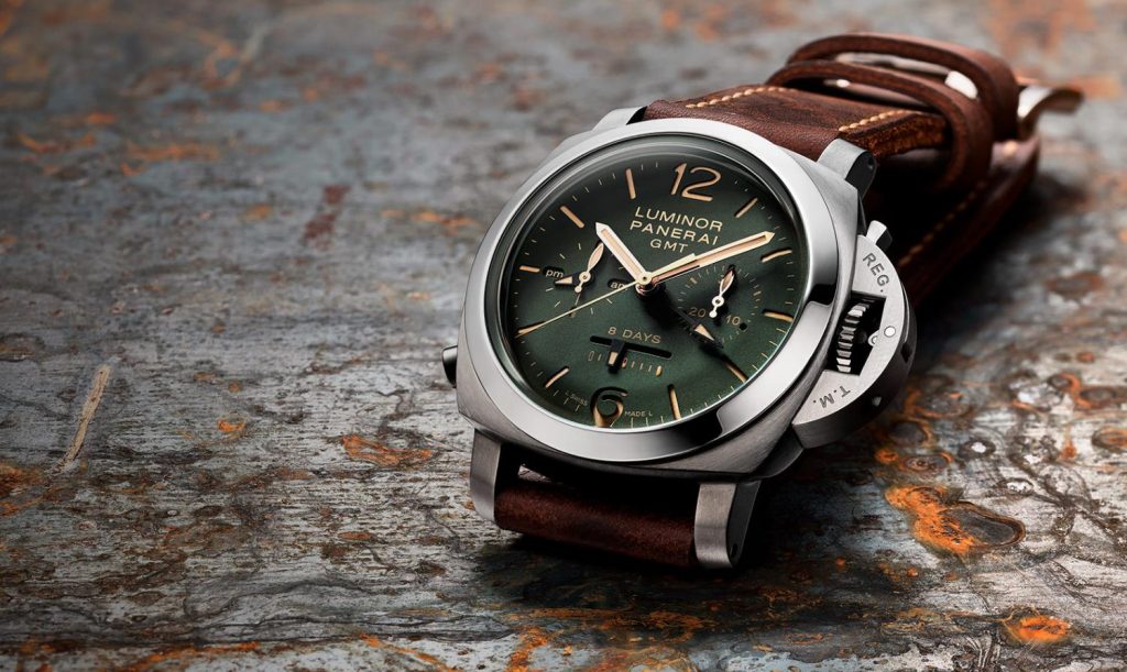 The brown strap fake watch has a green dial.